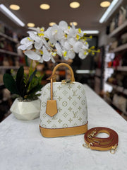 lv alma handbag and backpack