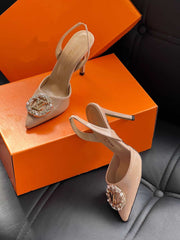 High heels with LV logo