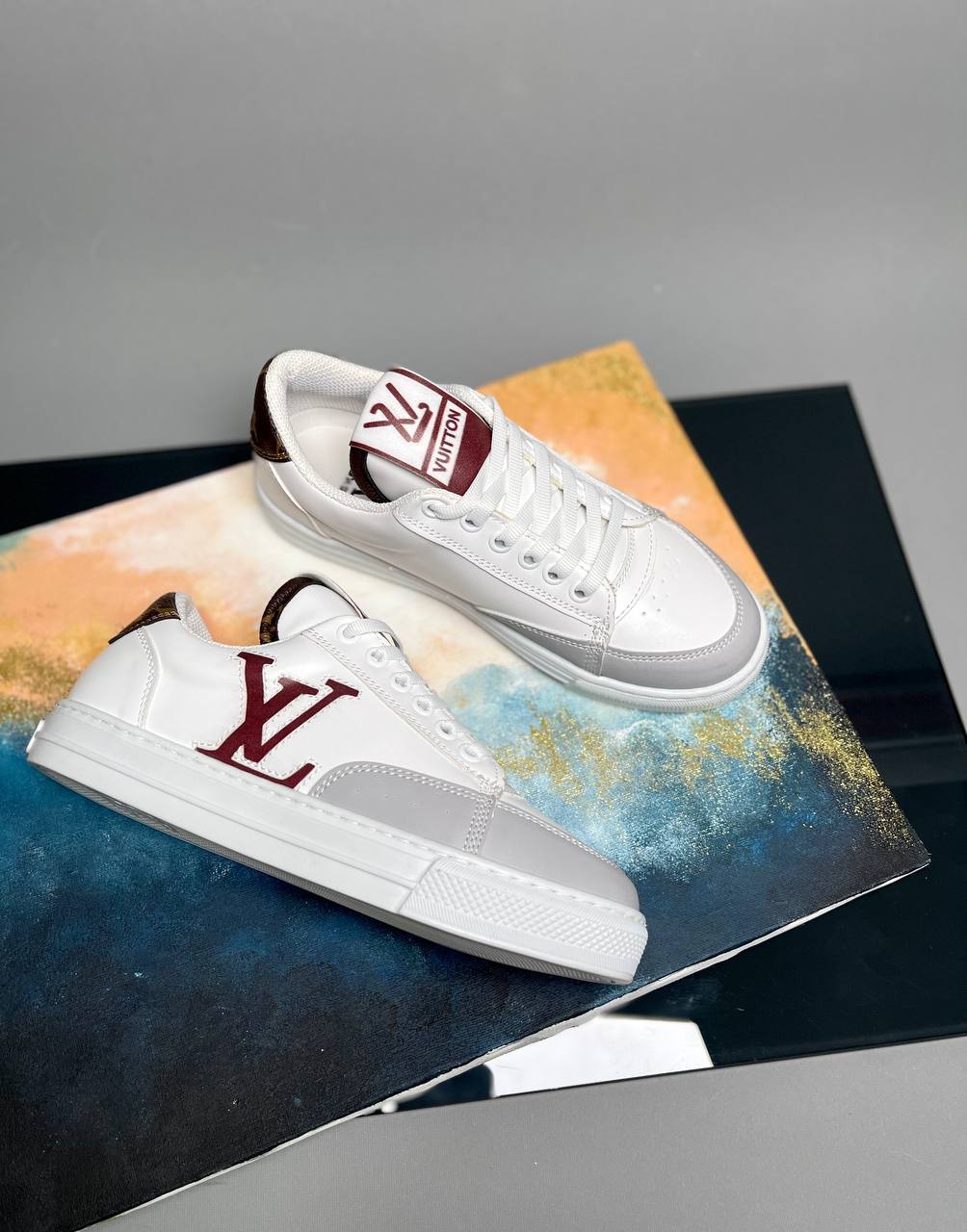 Sneakers with LV writing on your side