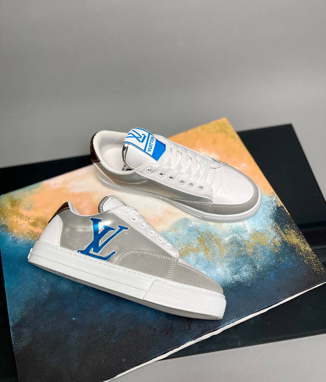 Sneakers with LV writing on your side