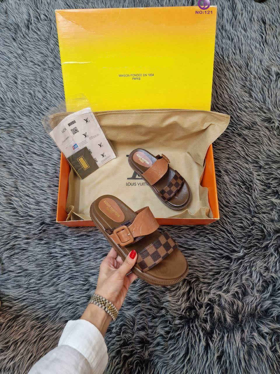 Large slippers with LV pattern