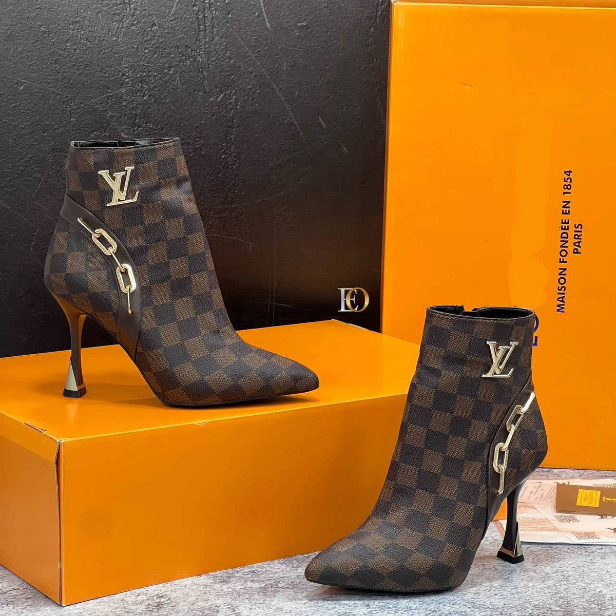 LV pointed heel boots