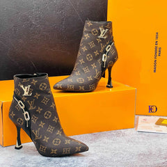 LV pointed heel boots