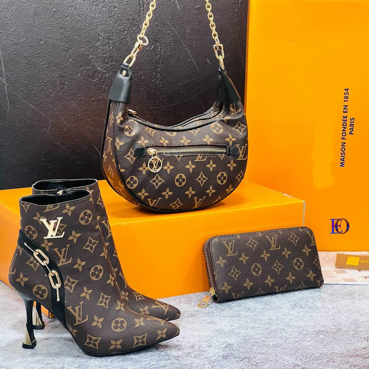 LV pointed heel boots set