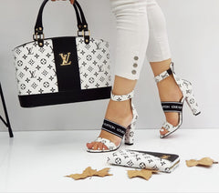 white LV heeled shoes set