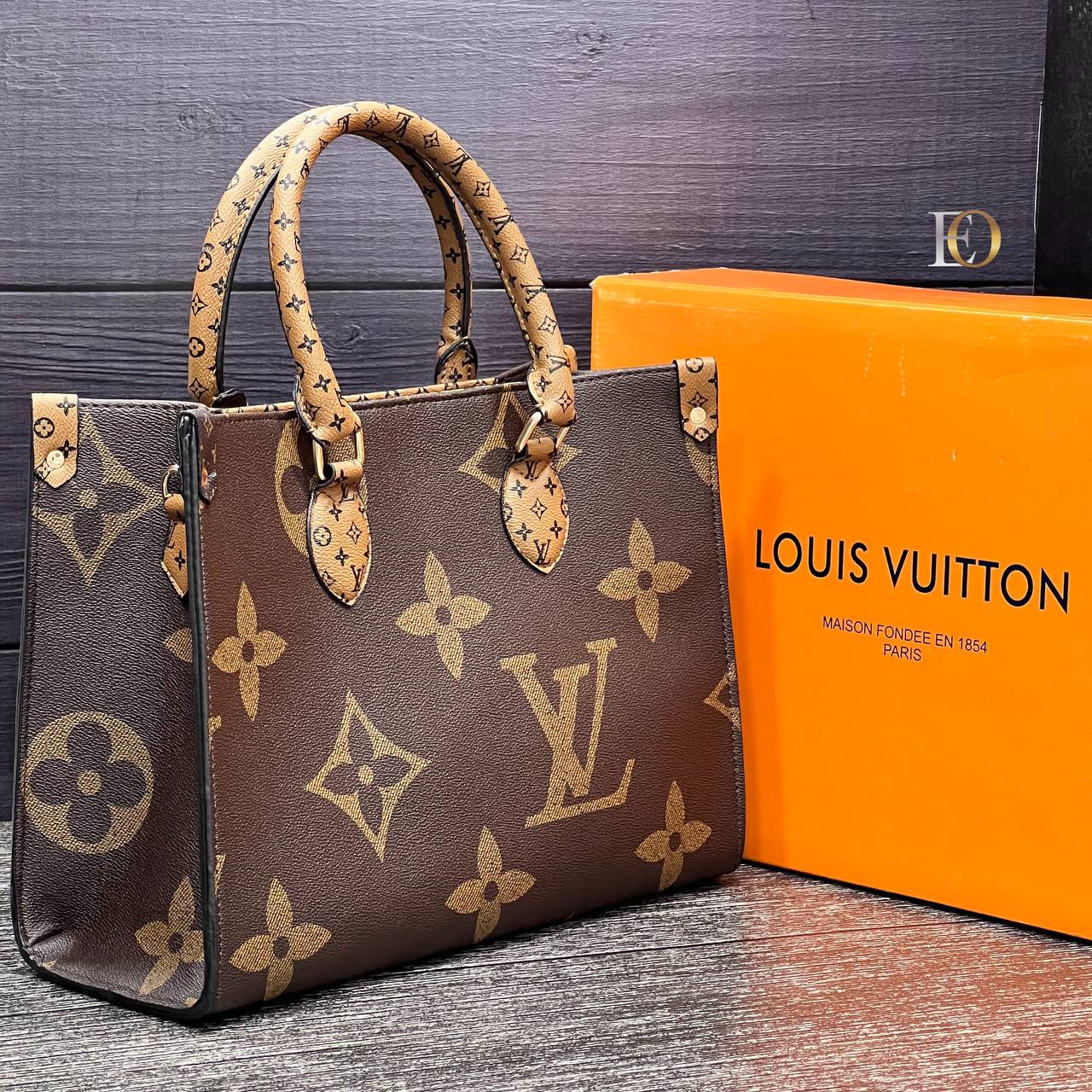 Bag model with large LV logo on it