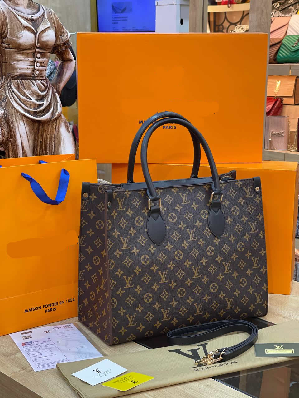 LV ONTHEGO HANDBAG