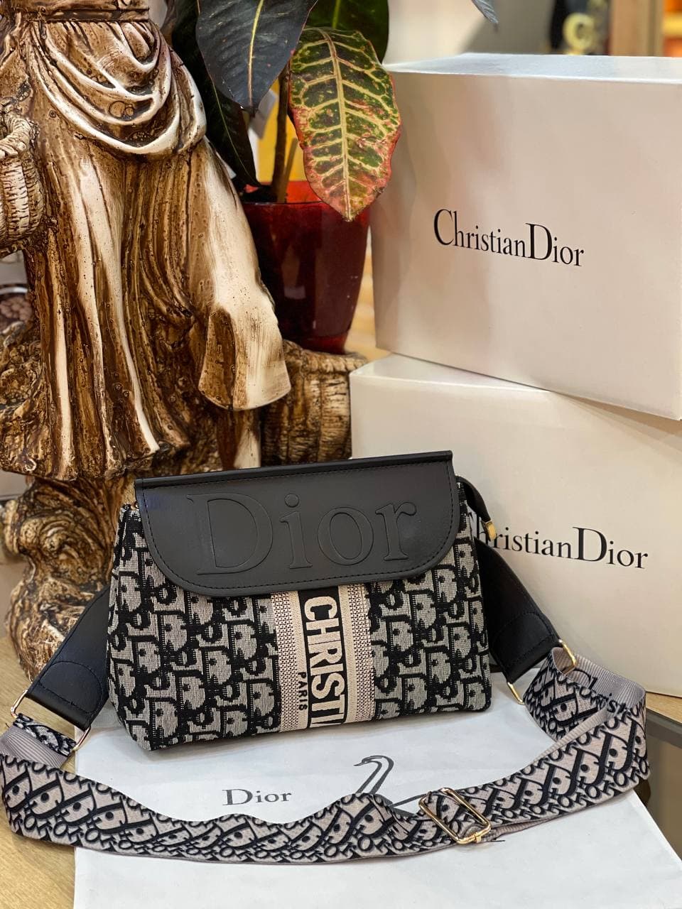 Christian D bag with feather detail